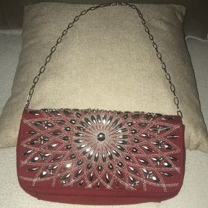 White House,Black Market,red studded purse.